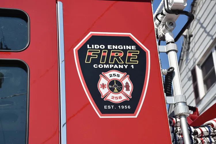 Cab side close-up showing shield-style station patch near the door