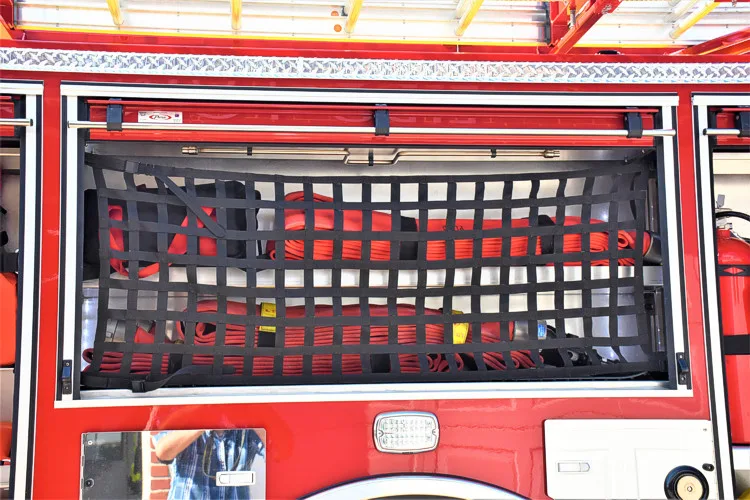 Rear hosebed close-up showing netted opening and rear compartment details
