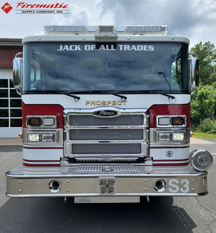 Head-on front view showing grille, bumper intake, and warning lights