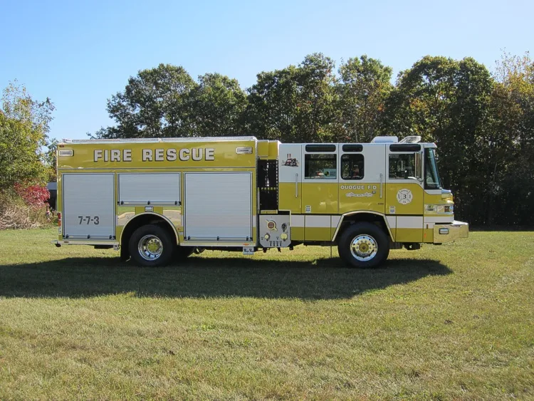 Heavy rescue truck full side profile view showing long compartment line