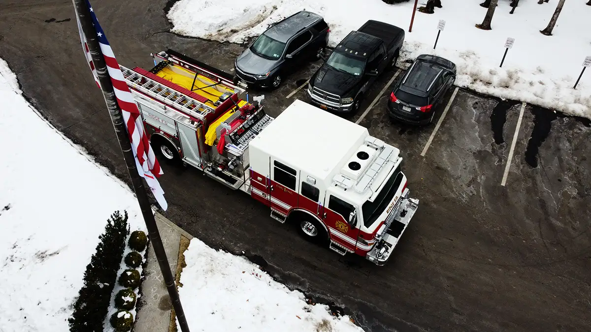 Aerial top-down rear view showing hosebed area and rear body section