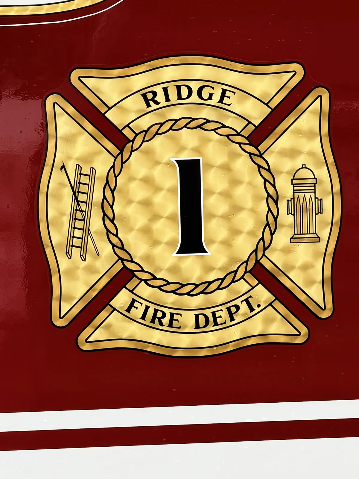 Body badge close-up showing TAK-4 suspension emblem