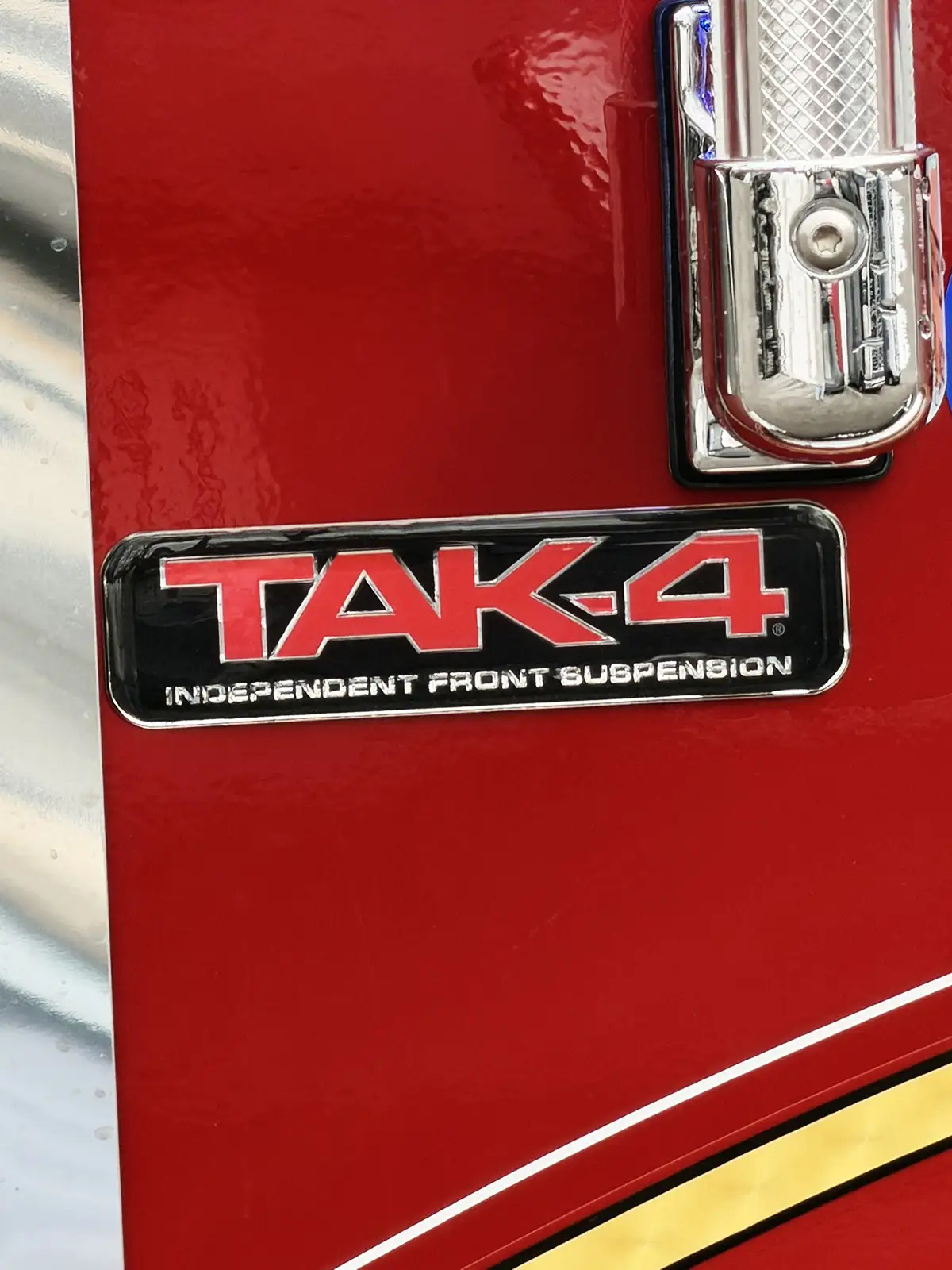 Rear deck view showing hosebed nozzles and stacked hose bundles