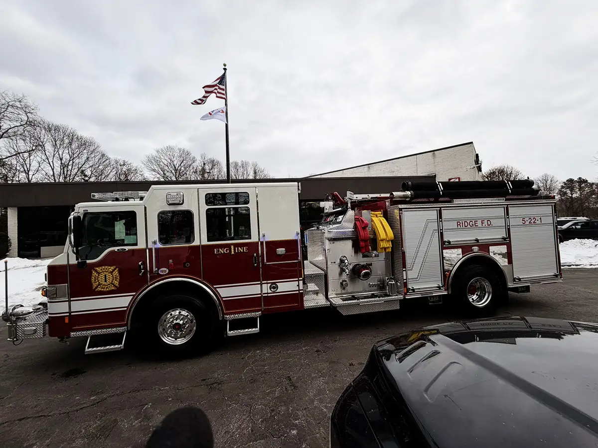 Rear deck close-up showing hose fittings and intake outlets