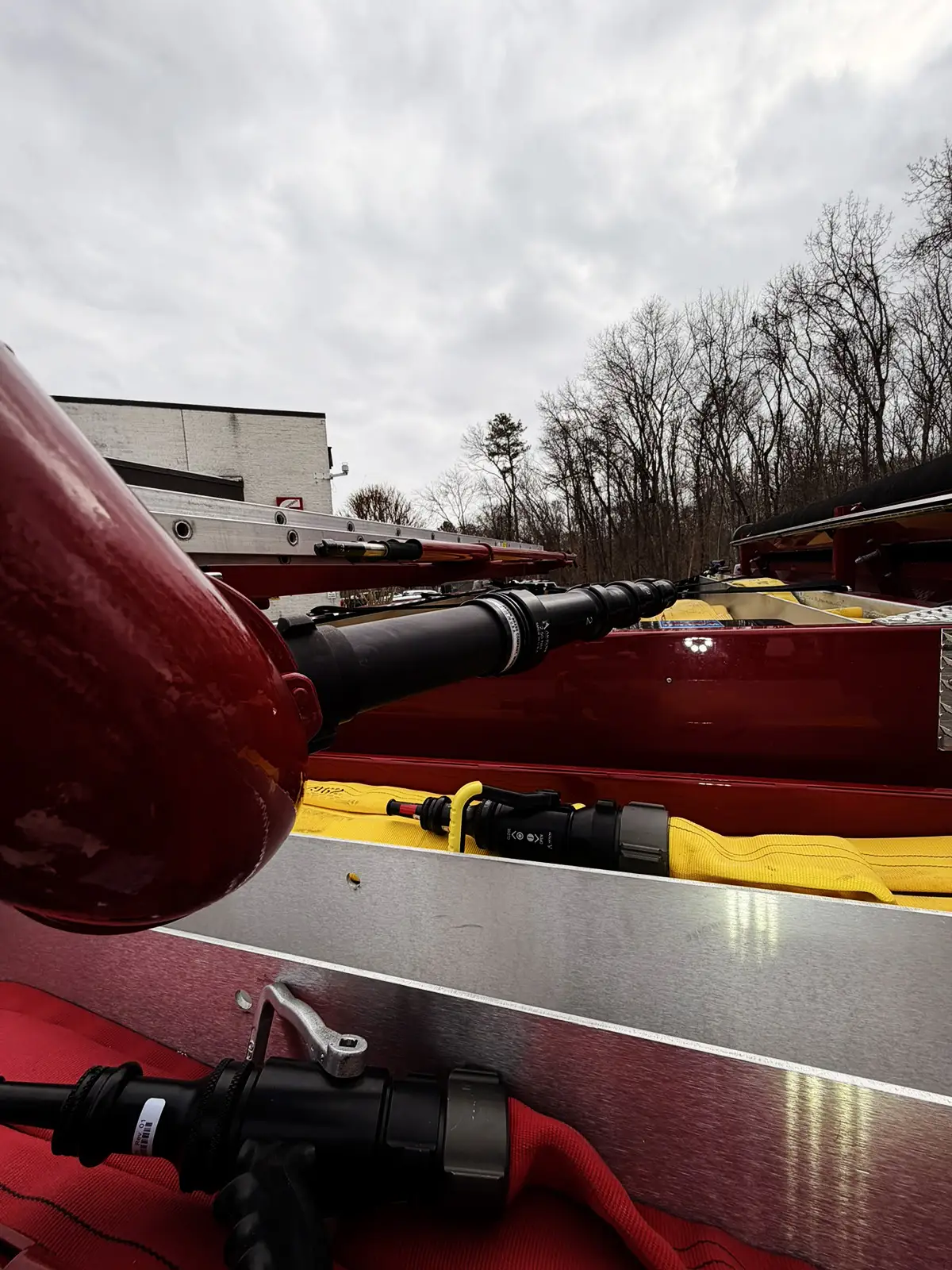 Hosebed view showing deck gun piping and stacked hose loads