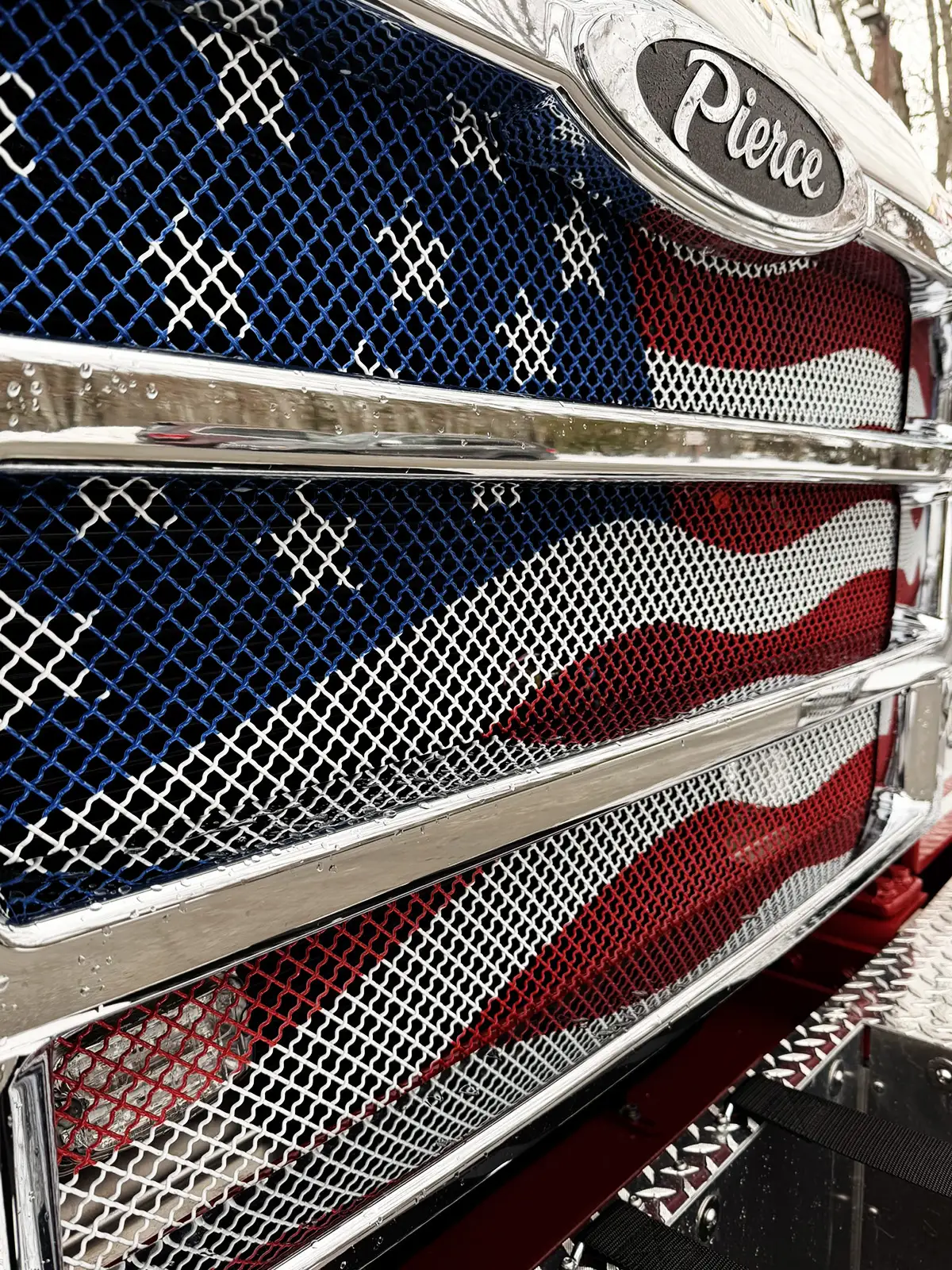 Custom crest badge close-up mounted on black panel