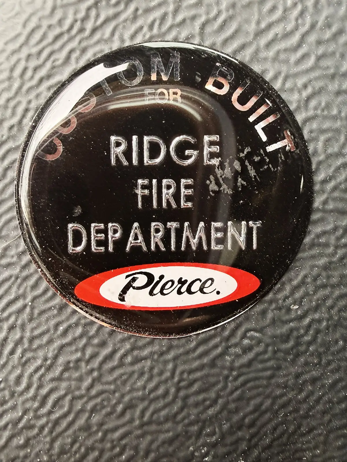 Cab-side control strip close-up showing rocker switches and indicator lights