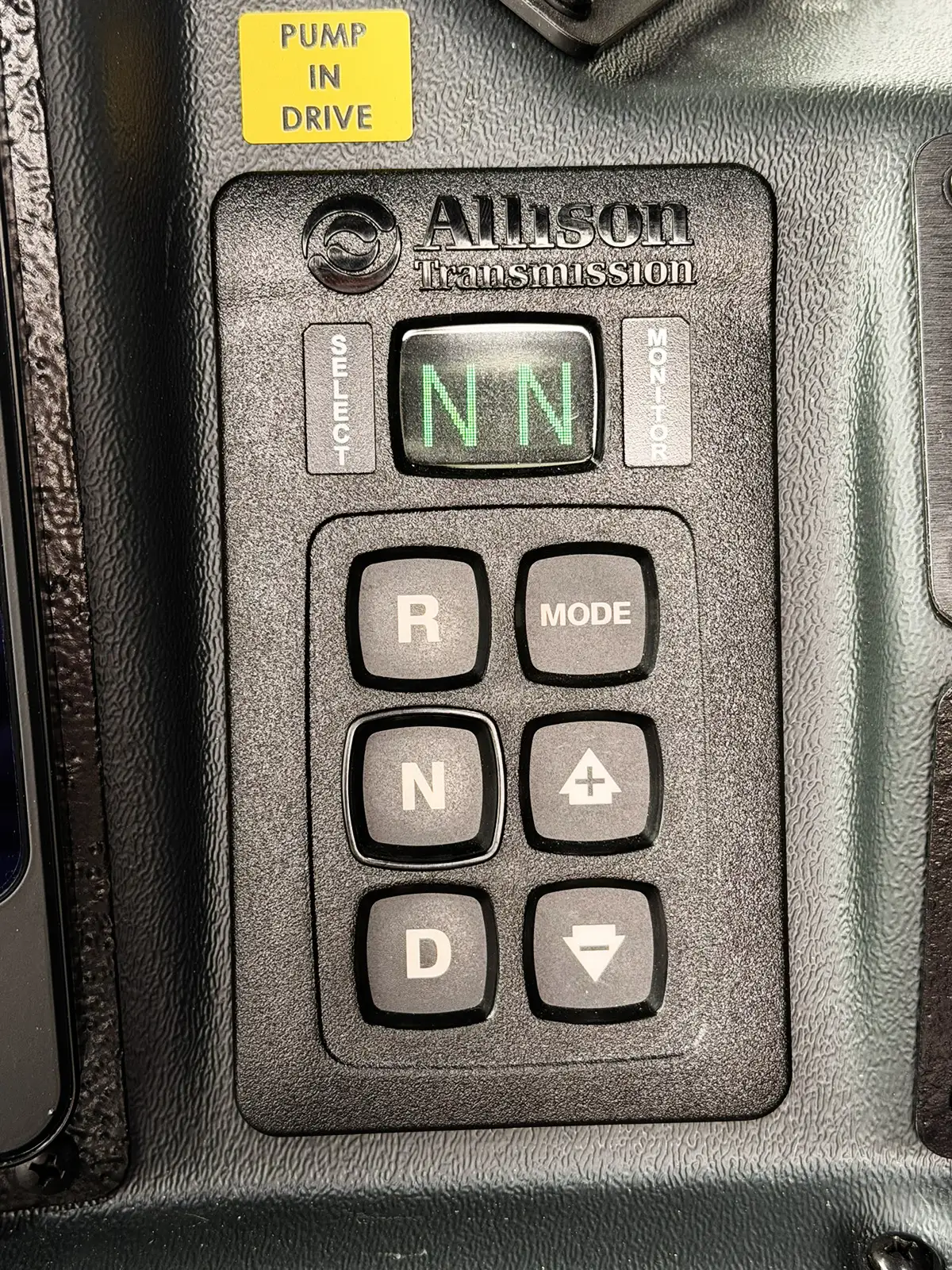 Cab switch panel close-up showing ENG BRK and scene light buttons