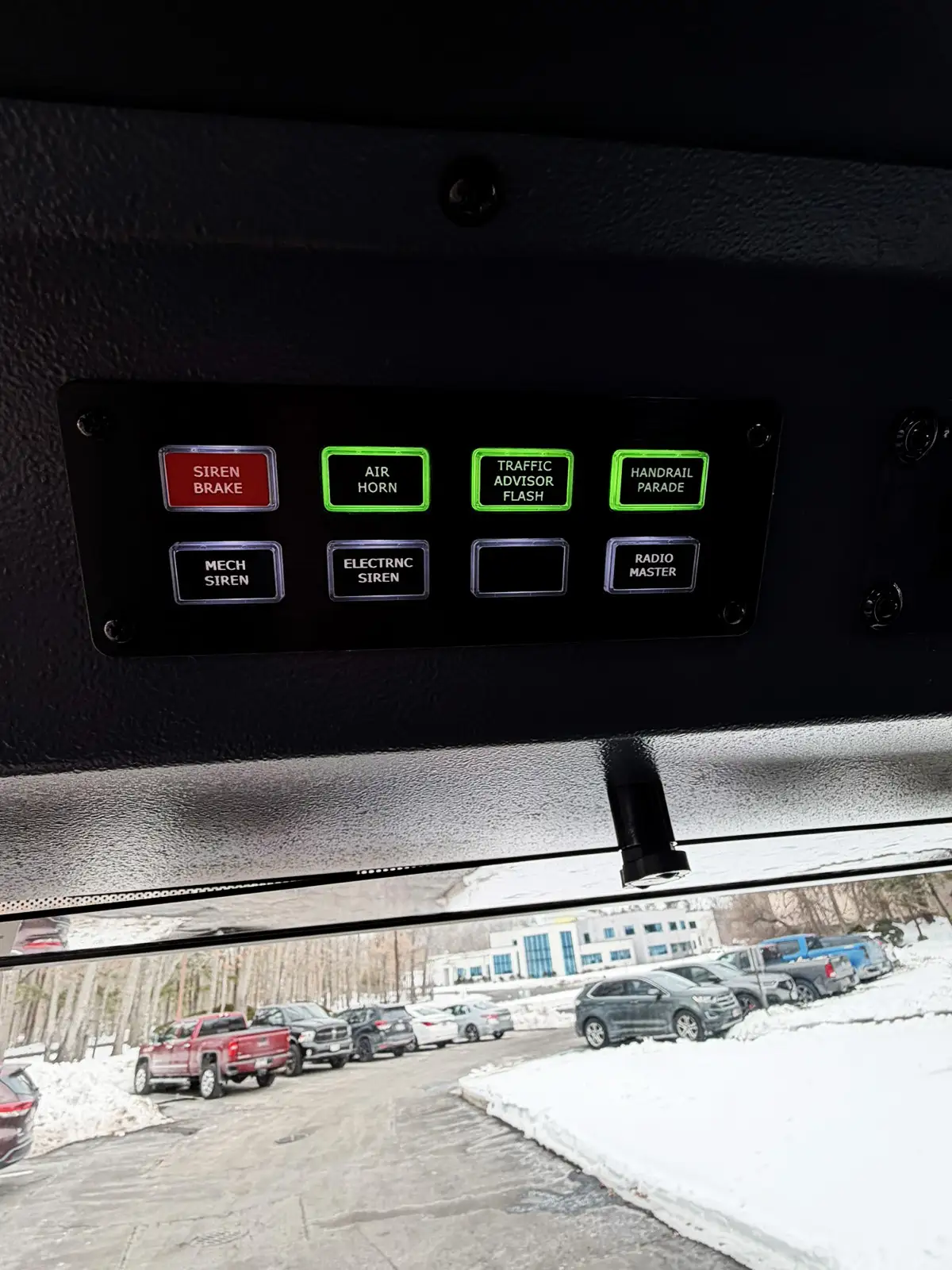 Crew cab interior view showing forward-facing rear seats and restraints