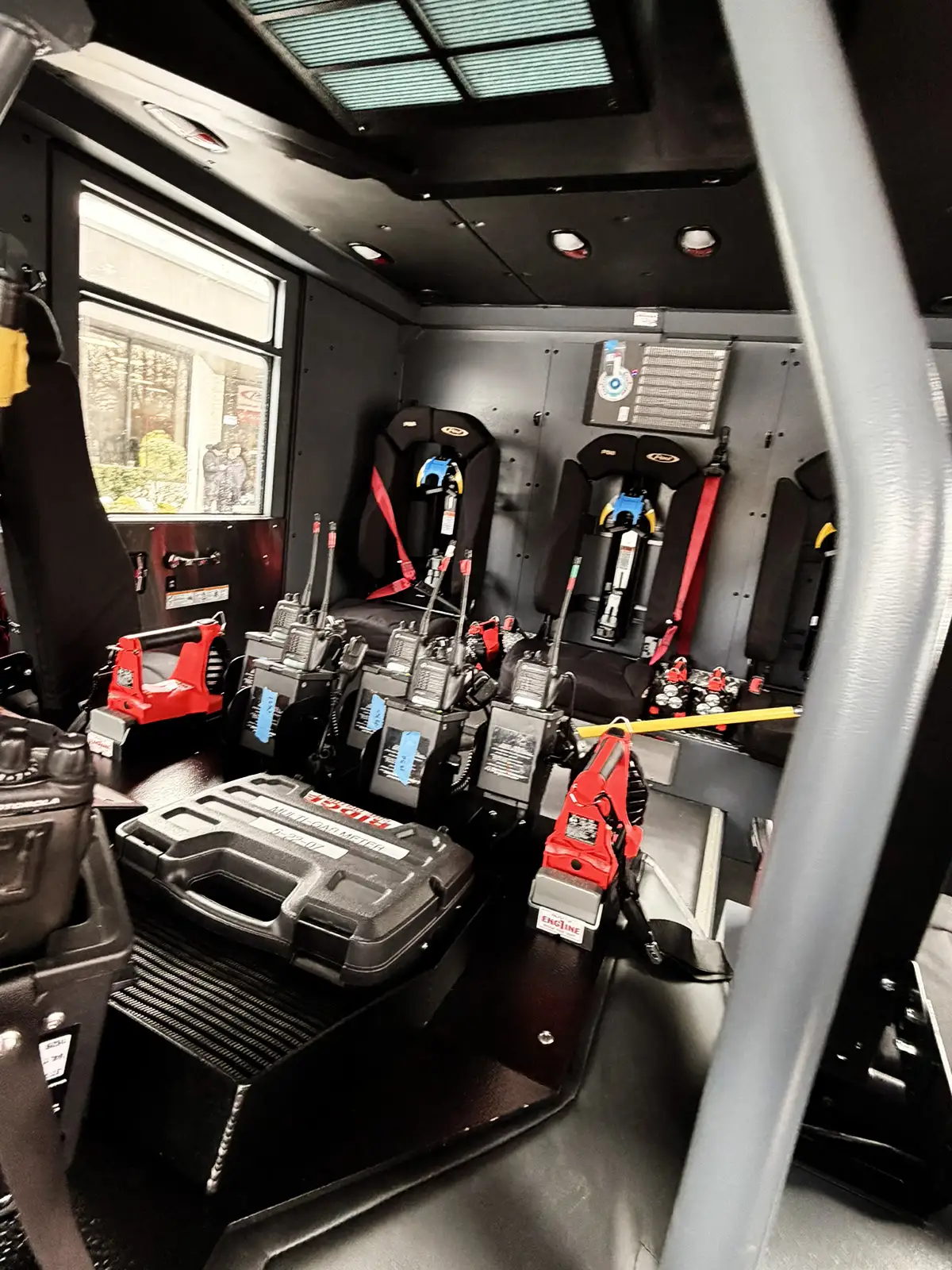 Cab interior side view showing front seat and side window