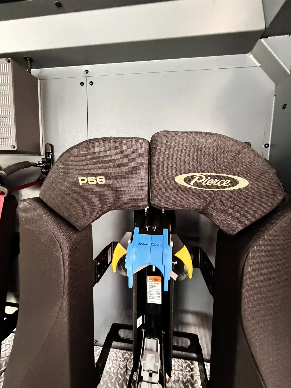 Open side compartment showing divided shelving and lower storage bay