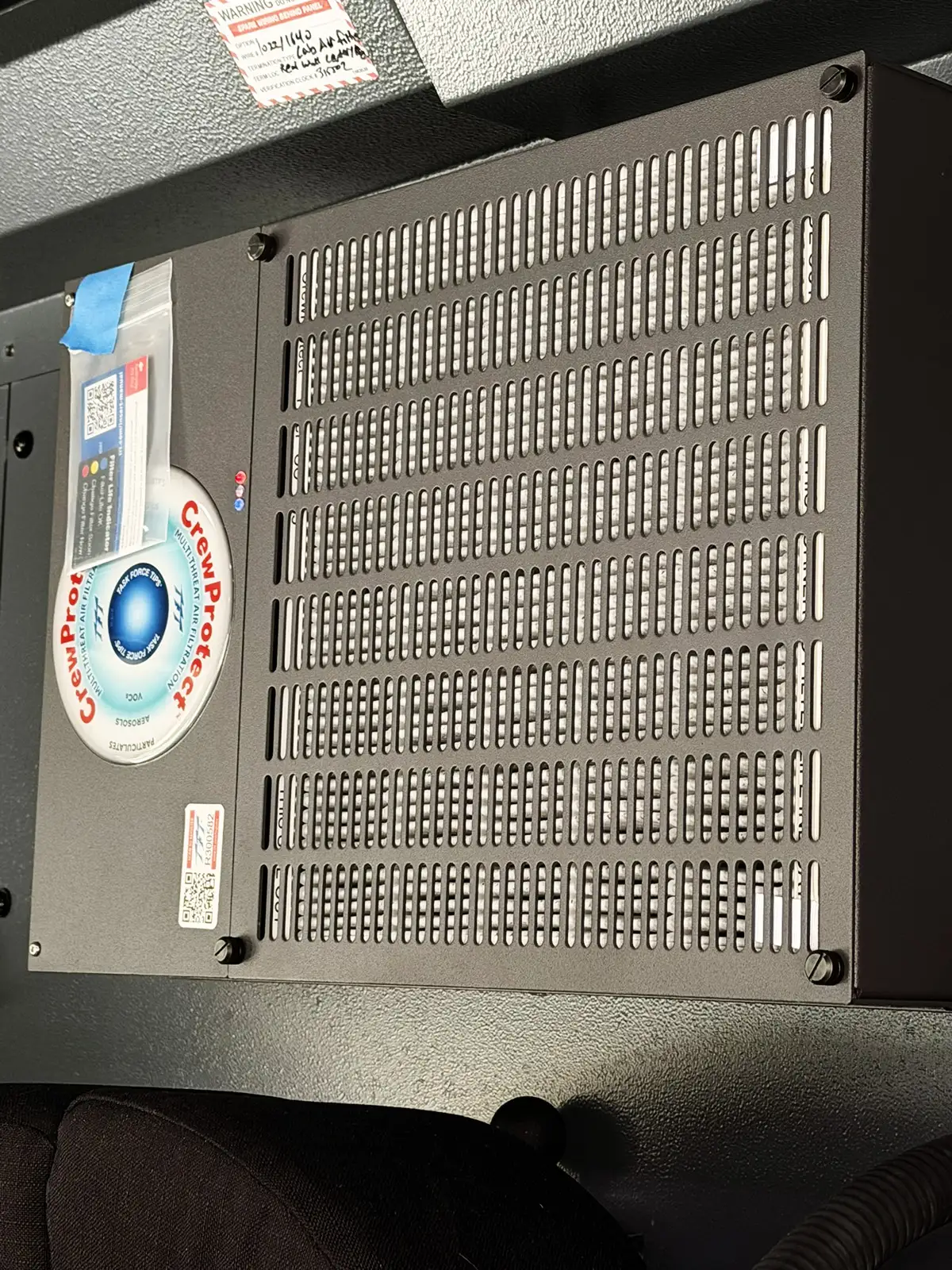 Open side compartment showing shelf dividers and empty gear trays