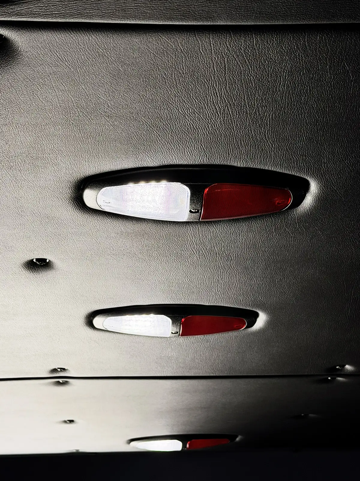 Open side compartment with pull-out tray showing mounted rescue tools