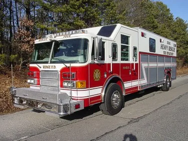 Front-left exterior view showing cab corner and side rescue body