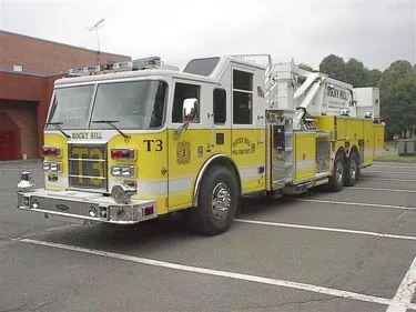 Front-right exterior view showing cab and ladder sections