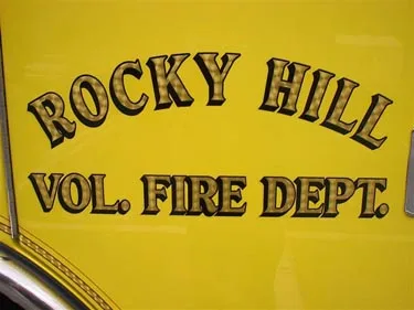 Side lettering close-up showing Rocky Hill department text