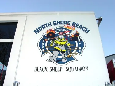 Cab side close-up showing logo and side window panel