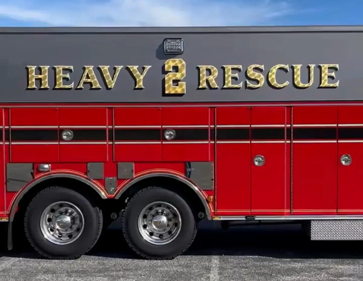 Body side close-up showing raised heavy rescue lettering