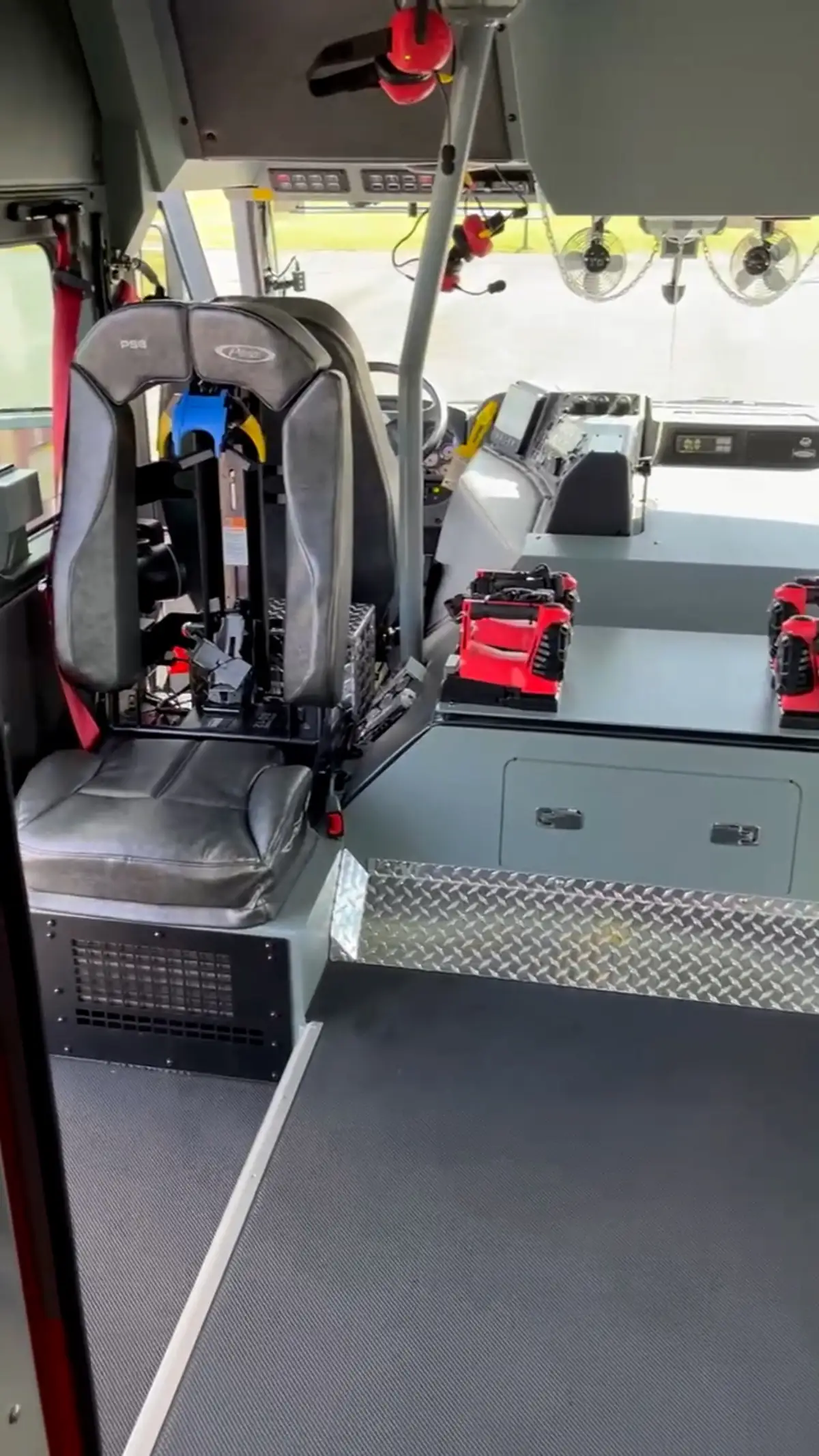 Cab interior view showing rear seat and center aisle
