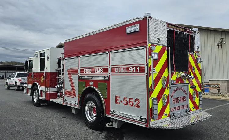 Pumper rear-right exterior view with closed compartments and hosebed netting