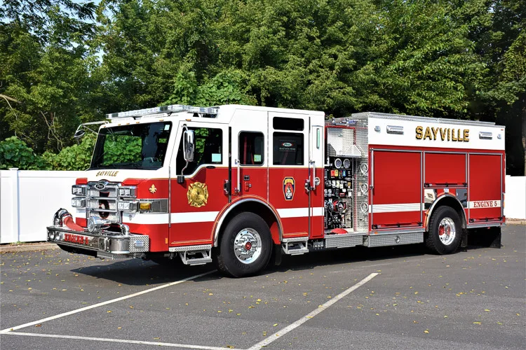 Driver-side profile view showing side compartments and mid-body pump section