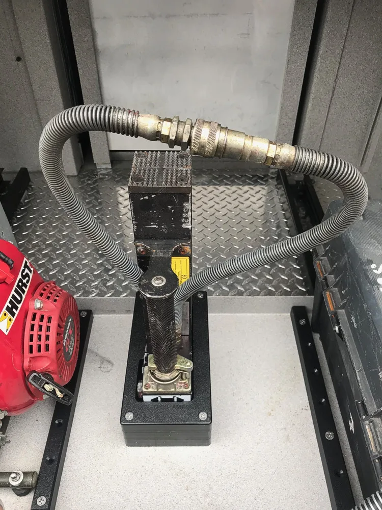 Top deck close-up showing monitor piping and hosebed fittings