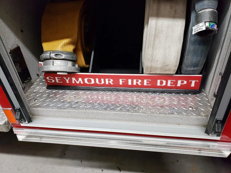 Rear compartment close-up showing stepwell area and rear shelf lip
