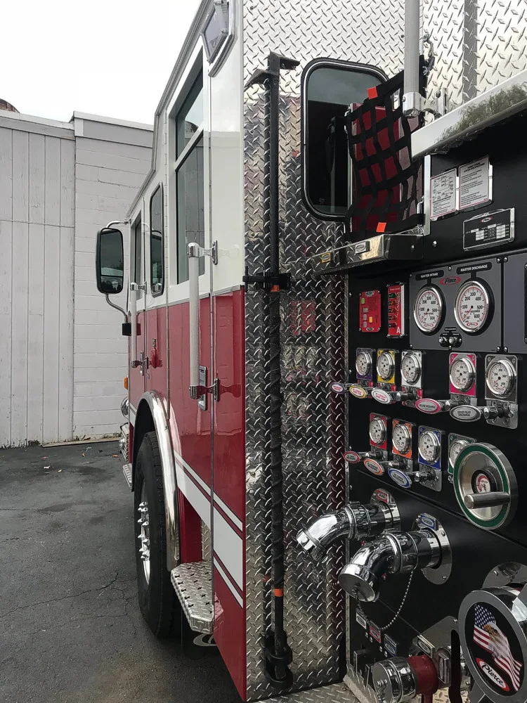 Pump-side close-up showing gauges and intake controls beside cab