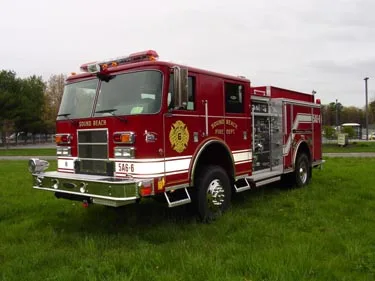 Front-right exterior view showing cab and side compartments