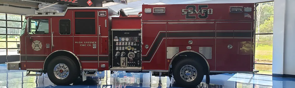 Driver-side banner crop showing side profile and wheel area