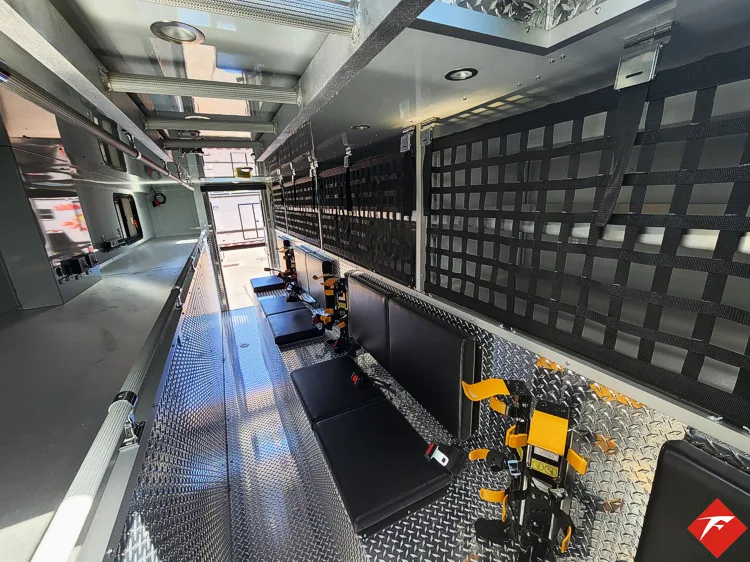 Walk-in rescue interior view showing long aisle and equipment mounting channels