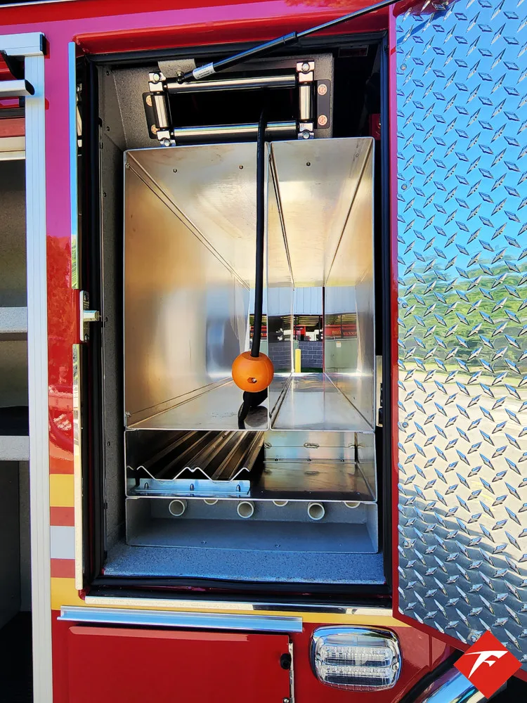 Open rear doorway view showing interior aisle and equipment area