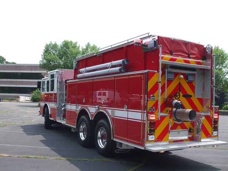 Rear-right exterior view showing chevron rear panel and side hose tube storage