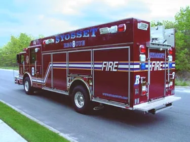 Rear-right exterior view showing side body and rear wheel area