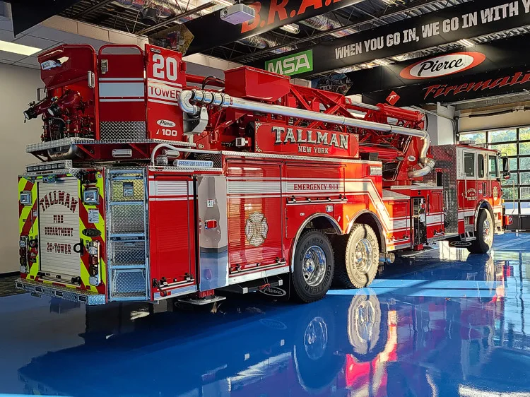 Rear-left interior view showing side body and tandem rear wheels