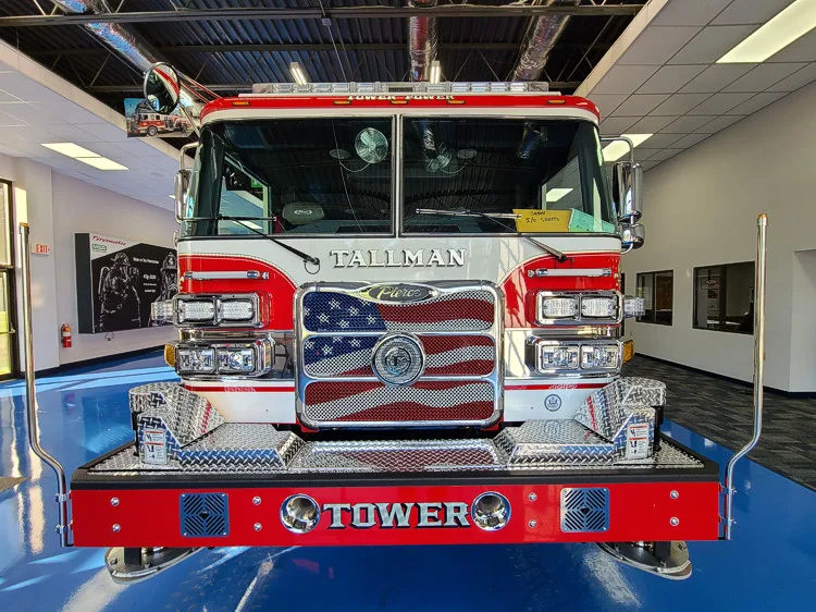 Head-on front view showing grille and American-flag style front panel