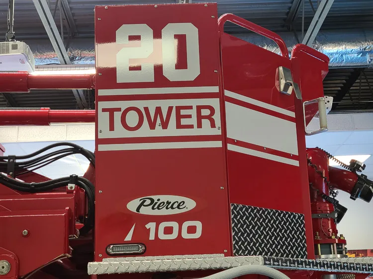 Body side close-up showing large tower unit number on side panel