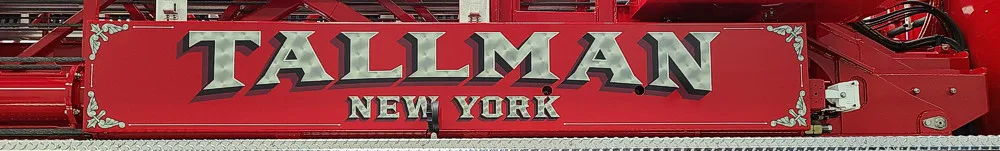 Body side lettering close-up strip showing Tallman New York script