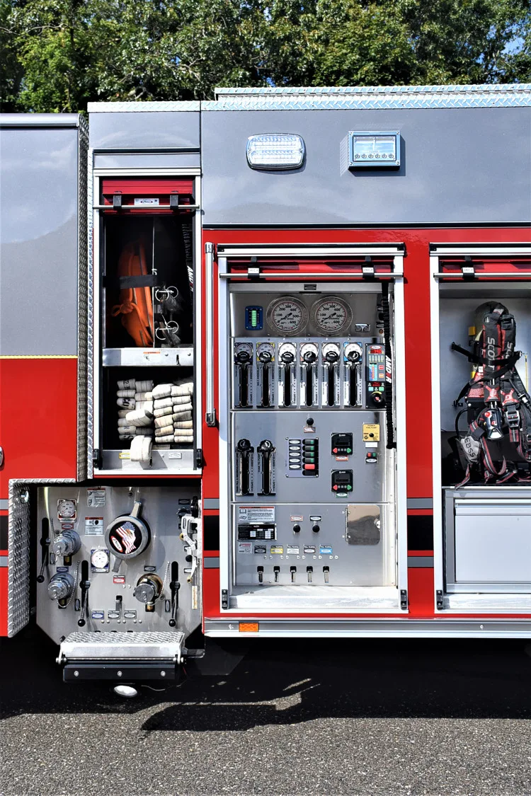 Pump panel close-up showing gauges, intake controls, and labels