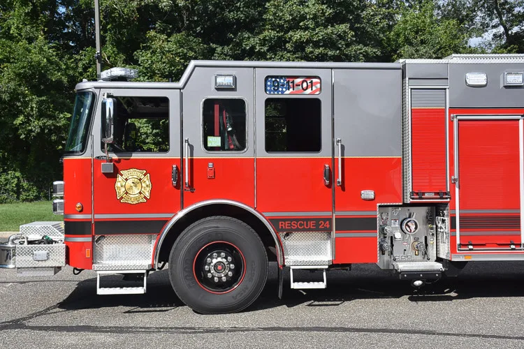 Cab-side profile showing enclosed cab and rear body section