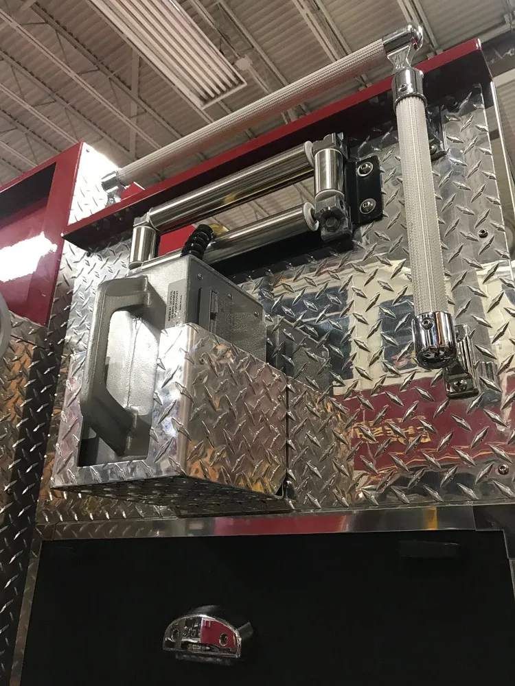 Top deck compartment close-up showing mounted nozzles and fittings