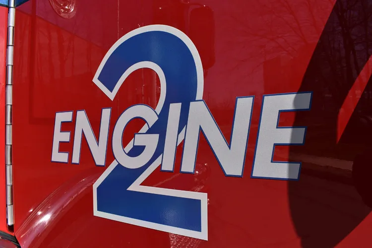 Body panel close-up showing large unit number on red side panel