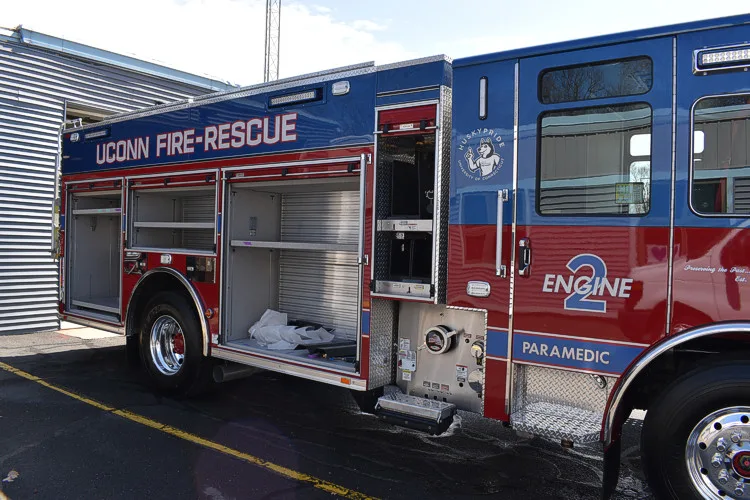 Officer-side profile view with side compartment doors open