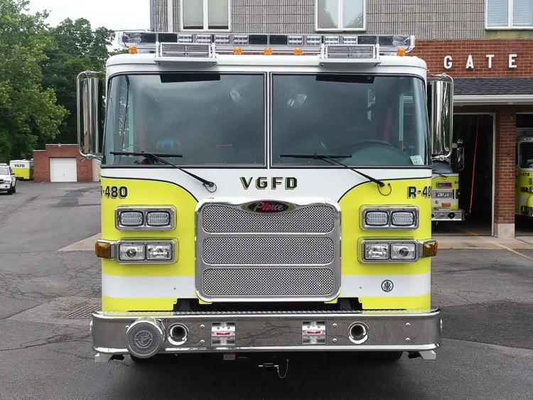 Head-on front view showing grille, windshield, warning lights, and front bumper intake ports.