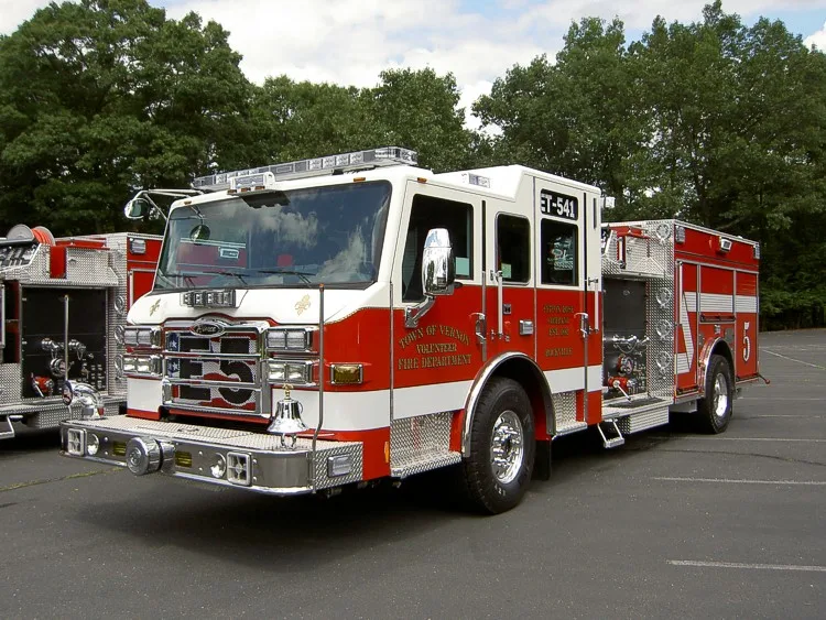 Pumper front-left exterior view showing cab and side body