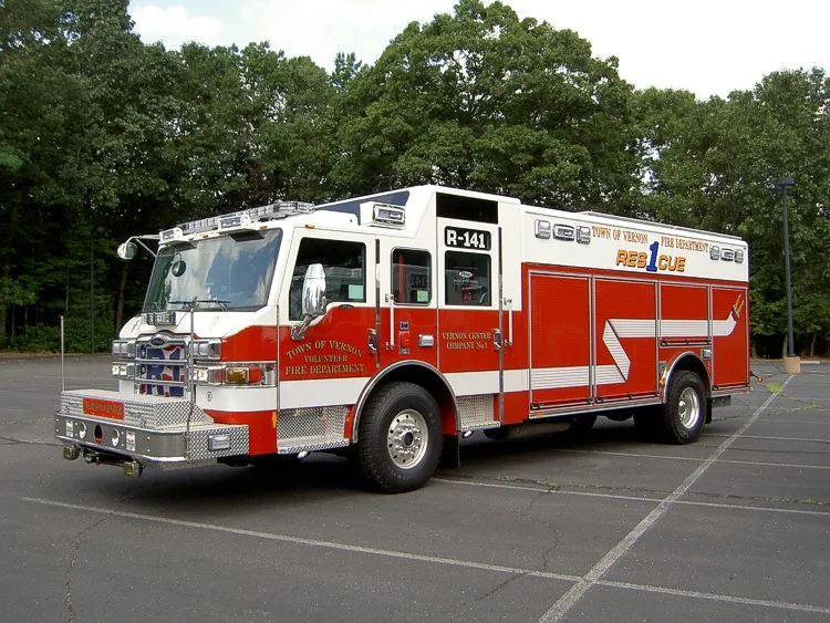 Driver-side profile view showing full pumper body and wheelbase