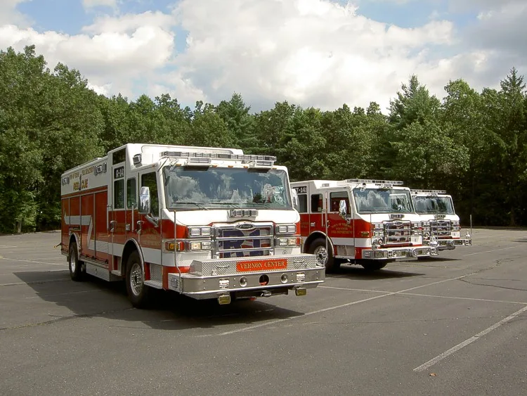 Front-left view of pumper lineup showing cabs and side bodies