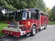 Wide front-left thumbnail view of the heavy rescue pumper parked roadside.