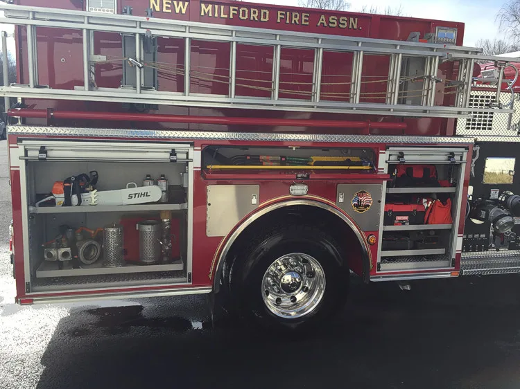 Cab door emblem close-up showing crest graphic and number panel