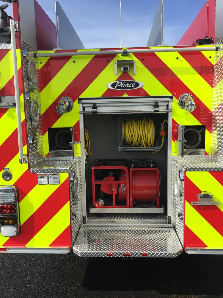 Pump panel close-up showing gauges, valves, and control levers